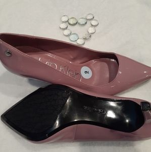 Size 9 Calvin Klein pumps. BRAND NEW! Never worn.